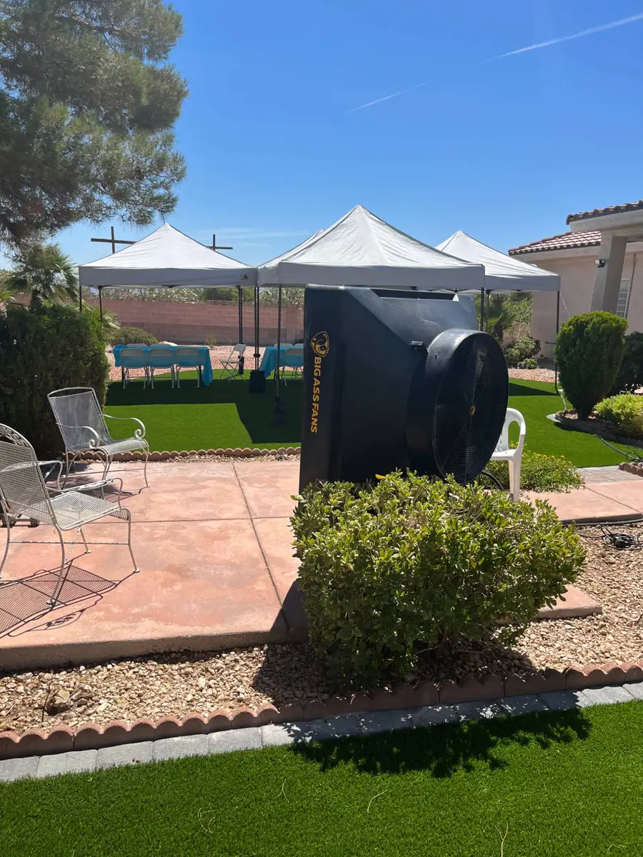 BAF Cool Space 400 swamp cooler rental cooling a backyard party with canopy tents in Las Vegas