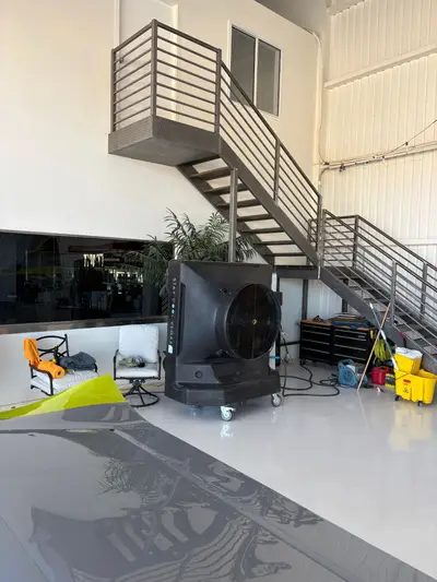 Portable swamp cooler rental keeping a Las Vegas hangar workshop cool in summer